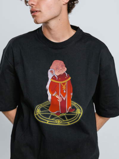 a young man wearing a black t-shirt with the Dungeon Master design by Natalia Salvador