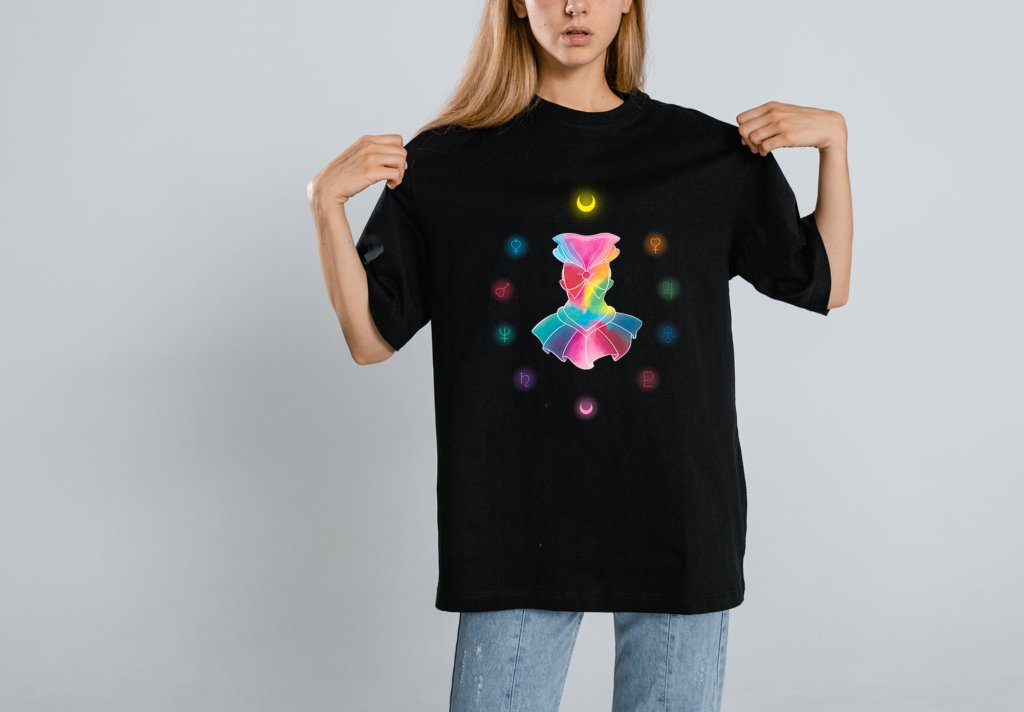 a woman wearing a black t-shirt with the Pretty Soldier Transformation design by Natalia Salvador